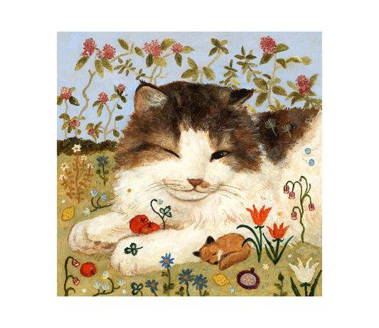 Sleepy cat in the garden