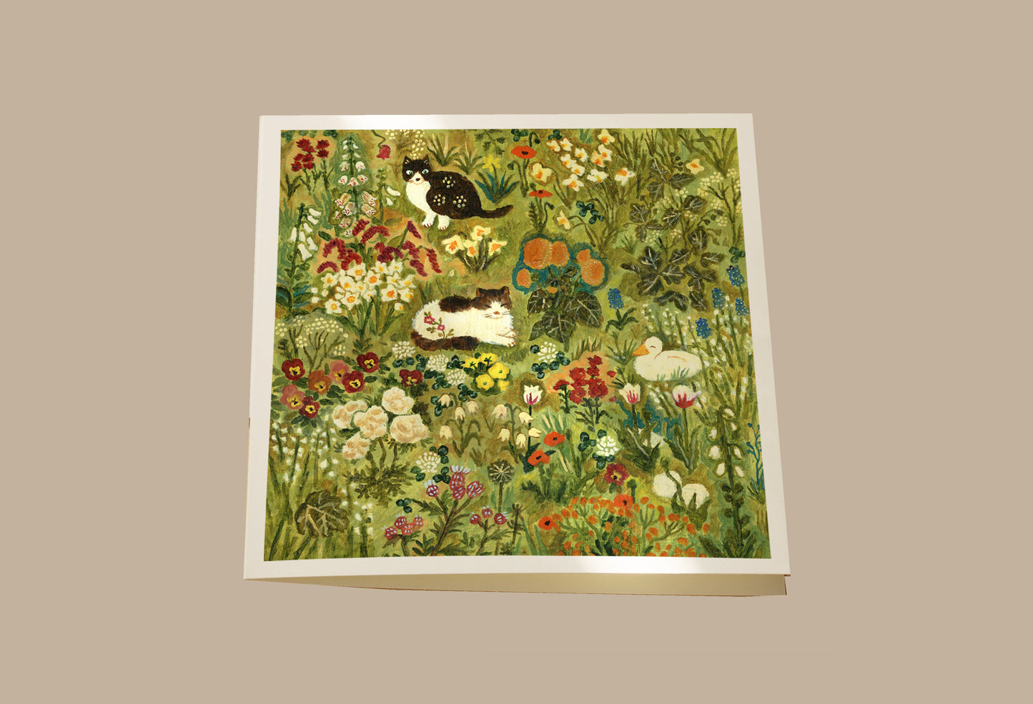 Two Cats and a Duck in the Garden