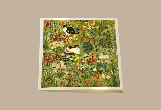 Two Cats and a Duck in the Garden