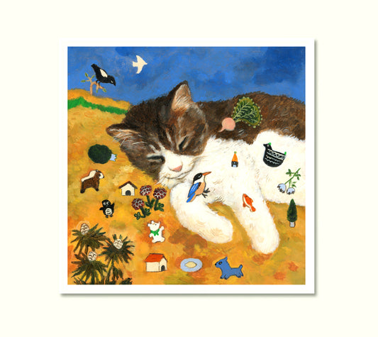 A cat sleeping in a wheat field - Greeting card